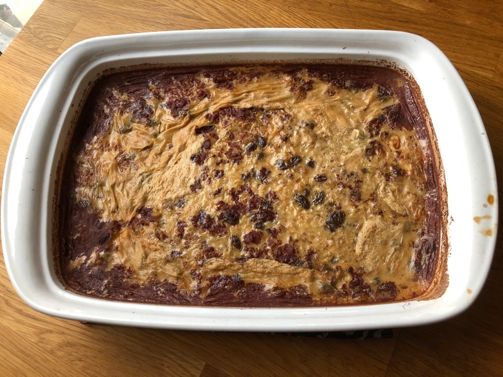 2 1/4 hours - still too much liquid even though it had developed a skin.